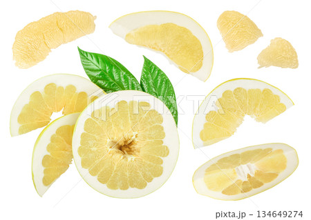 half of pomelo with slice and leaf isolated on white background. Top view. Flat lay. half of pomelo with slice and leaf isolated on white background. Top view. Flat lay. 134649274