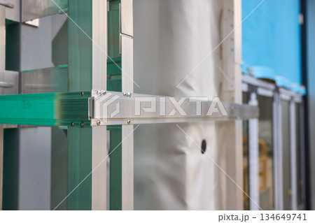 A Detailed Close Up View of the Intricate Frame Structure of a Modern Innovative Building Design 134649741