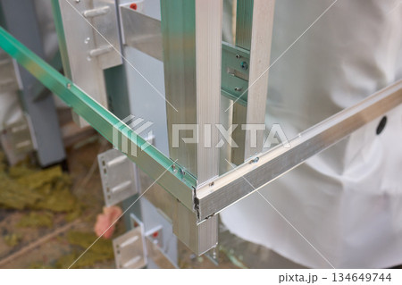 A Detailed Close Up View of the Intricate Frame Structure of a Modern Innovative Building Design A Detailed Close Up View of the Intricate Frame Structure of a Modern Innovative Building Design 134649744