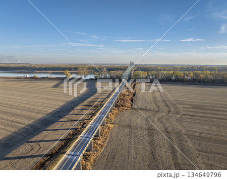 bridge on the Mississippi River at confluence with the Ohio River below Cairo, IL, November aerial view 134649796