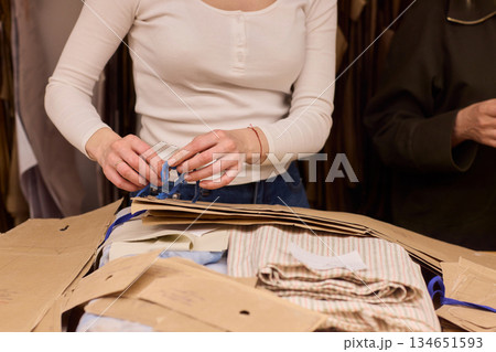 Tailoring Craftsmanship A Fashion Designer at Work Creating Beautiful Patterns with Precision Tailoring Craftsmanship A Fashion Designer at Work Creating Beautiful Patterns with Precision 134651593