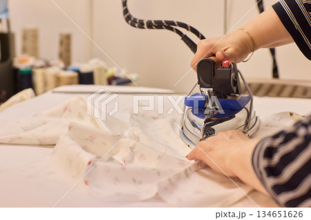 Ironing Clothes for a Neat, Tidy Finish at Home for Better Presentation and Appearance Ironing Clothes for a Neat, Tidy Finish at Home for Better Presentation and Appearance 134651626