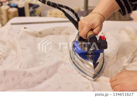 Ironing Clothes for a Neat, Tidy Finish at Home for Better Presentation and Appearance Ironing Clothes for a Neat, Tidy Finish at Home for Better Presentation and Appearance 134651627