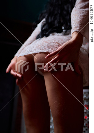 Sensual studio photograph highlighting elegant lingerie and confident posture, Artistic portrayal of provocative fashion in softly lit setting emphasizing charm and allure Sensual studio photograph highlighting elegant lingerie and confident posture, Artistic portrayal of provocative fashion in softly lit setting emphasizing charm and allure 134652677