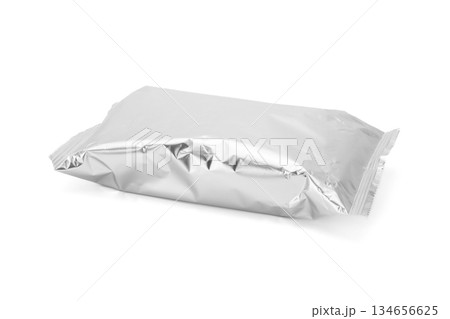 Blank silver foil snack packaging bag mockup isolated on a white background Blank silver foil snack packaging bag mockup isolated on a white background 134656625