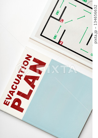 Detailed evacuation plan showing safe routes and exits for emergency preparedness Detailed evacuation plan showing safe routes and exits for emergency preparedness 134656632