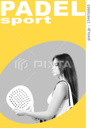 Woman holding padel racket against a bright yellow background during a sports session 134656665