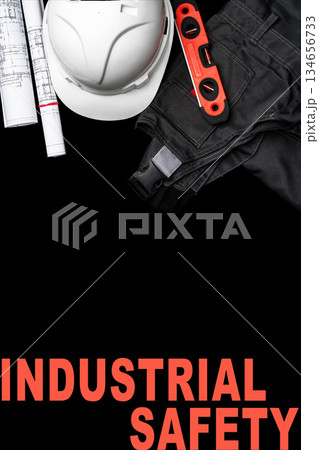 Tools and equipment for industrial safety at a construction site with plans and helmet Tools and equipment for industrial safety at a construction site with plans and helmet 134656733