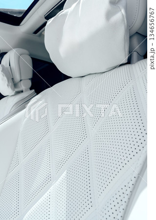 Detail view of modern car seat highlighting quality materials and design features 134656767