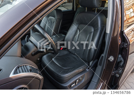 Leather interior of a modern vehicle captured on a sunny day 134656786
