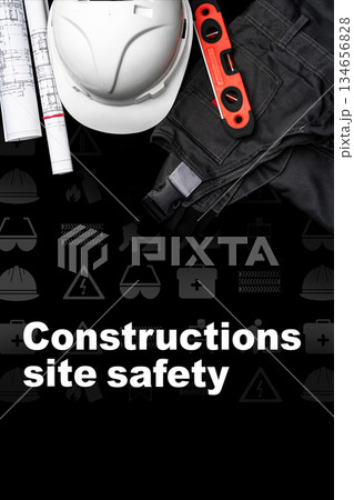 Focus on construction site safety with gear and tools on the surface Focus on construction site safety with gear and tools on the surface 134656828