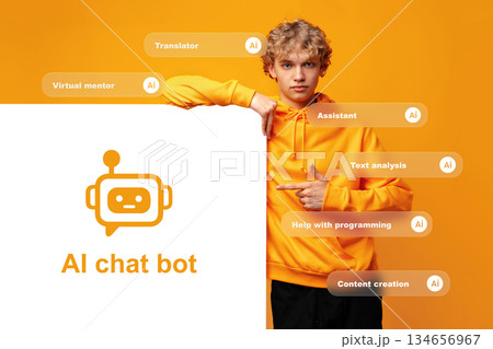 Person in yellow hoodie points to a sign with a chatbot logo and text in front of orange background 134656967