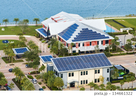 Solar photovoltaic panels installed on top of Florida office buildings for producing clean ecological electric energy. Renewable electricity with zero emission concept 134661322