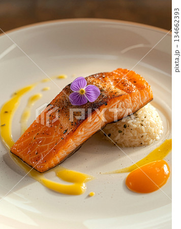 Pan-seared grilled salmon fillet served with rice, garnished with vibrant sauce and a purple edible flower on a white plate. Gourmet food photography for elegant fine dining and healthy menus. Pan-seared grilled salmon fillet served with rice, garnished with vibrant sauce and a purple edible flower on a white plate. Gourmet food photography for elegant fine dining and healthy menus. 134662393