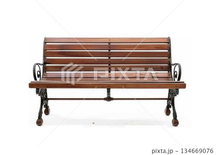 Vintage wooden park bench with ornate metal armrests 134669076