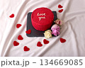 Red heart cake with roses and love message on slate plate for romantic celebration 134669085