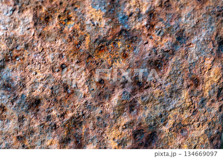 Close-up of rusty metal surface with corrosion and texture detail 134669097