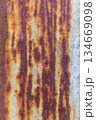 Close-up of rusty metal texture with orange and brown patterns 134669098
