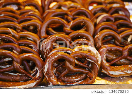 Traditional Fresh Baked German Pretzels with Salt in a Basket 134670256