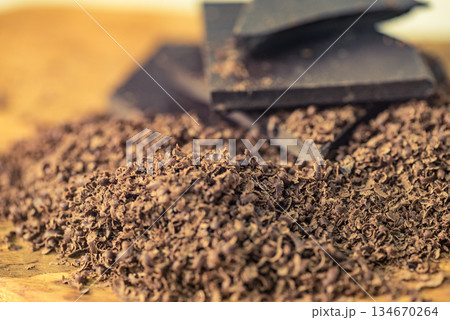Heap of grated chocolate closeup Heap of grated chocolate closeup 134670264