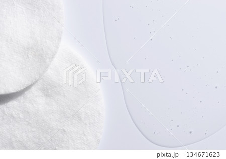 A cotton pad for removing makeup and micellar water. A cotton pad for removing makeup and micellar water. 134671623