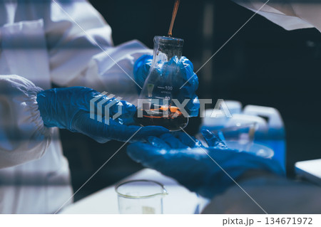 Researchers working in the clinical laboratory 134671972