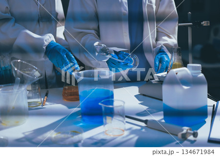 Researchers working in the clinical laboratory 134671984