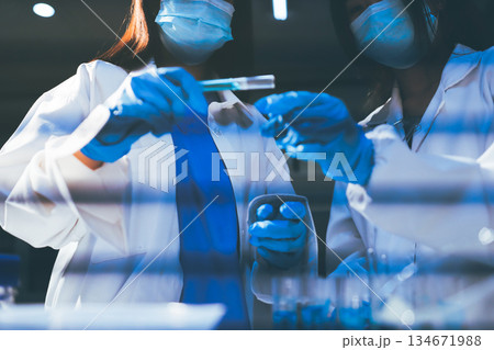 Researchers working in the clinical laboratory Researchers working in the clinical laboratory 134671988