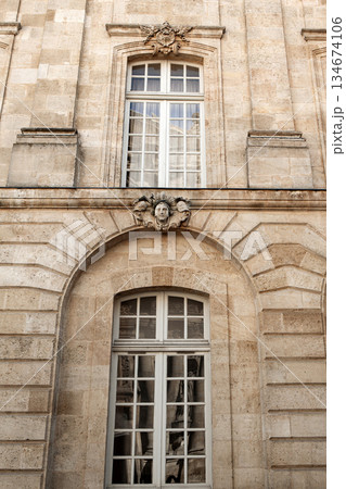 Stone facade of an old building 134674106