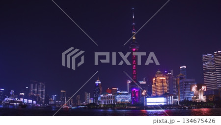 Dramatic nighttime panorama of Shanghai with dazzling skyscrapers. Dramatic nighttime panorama of Shanghai with dazzling skyscrapers. 134675426