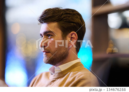 Gathering around the table for iftar during Ramadan with family sharing food and stories in a cozy atmosphere Gathering around the table for iftar during Ramadan with family sharing food and stories in a cozy atmosphere 134676288