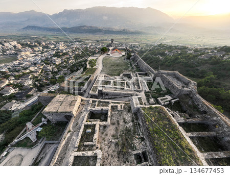 Gjirokaster castle with Clock tower, ottoman architecture houses in Albania, Unesco World Heritage Site, ancient town Gjirokaster castle with Clock tower, ottoman architecture houses in Albania, Unesco World Heritage Site, ancient town 134677453