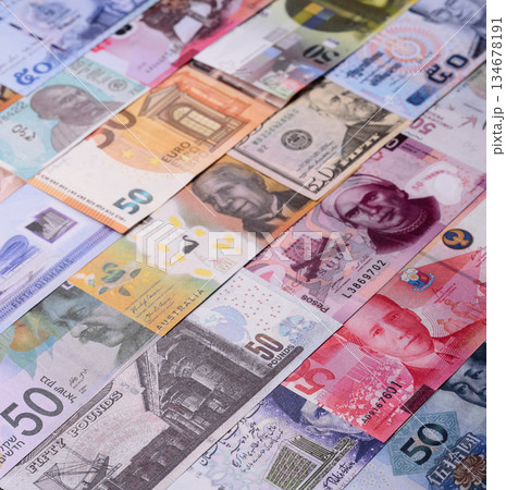 Paper money, banknotes of different countries as a business background. Paper money and cash 134678191