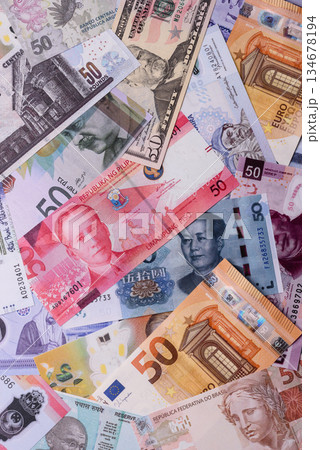 Paper money, banknotes of different countries as a business background. Paper money and cash 134678194