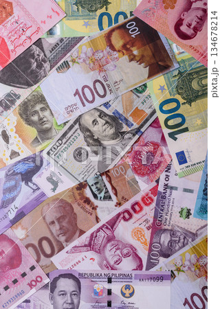 Paper money, banknotes of different countries as a business background. Paper money and cash Paper money, banknotes of different countries as a business background. Paper money and cash 134678214