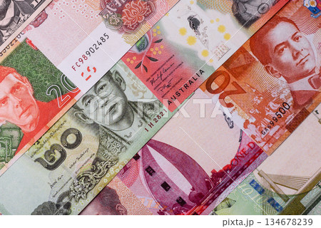 Paper money, banknotes of different countries as a business background. Paper money and cash 134678239