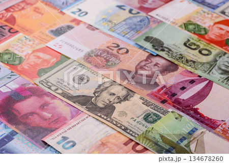 Paper money, banknotes of different countries as a business background. Paper money and cash 134678260