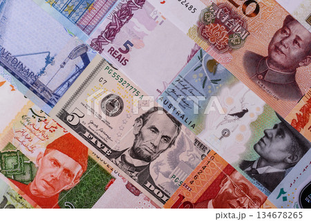 Paper money, banknotes of different countries as a business background. Paper money and cash Paper money, banknotes of different countries as a business background. Paper money and cash 134678265