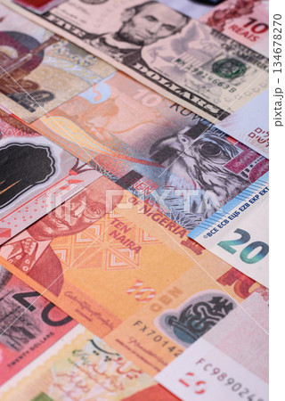 Paper money, banknotes of different countries as a business background. Paper money and cash 134678270
