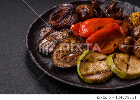 Grilled vegetables, bell peppers, mushrooms, and zucchini, a vegetarian meal. Grilled vegetables 134678511