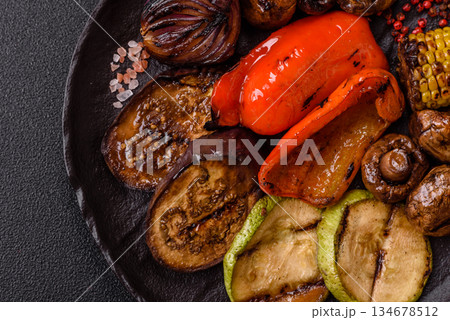 Grilled vegetables, bell peppers, mushrooms, and zucchini, a vegetarian meal. Grilled vegetables 134678512