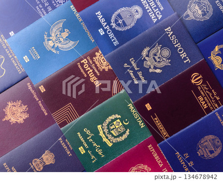 A background of several passports from different countries, an international ID card. Passport 134678942