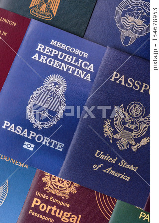A background of several passports from different countries, an international ID card. Passport 134678953