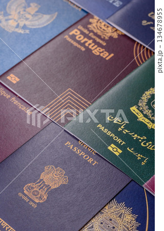 A background of several passports from different countries, an international ID card. Passport A background of several passports from different countries, an international ID card. Passport 134678955