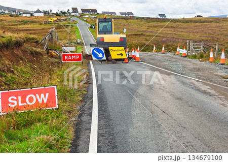 Rural roadworks with diversion signs on countryside road Scotland 134679100