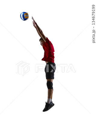 Volleyball player airborne during play isolated on white background. Volleyball player airborne during play isolated on white background. 134679199