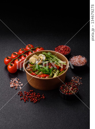 Seared tuna tataki in a bowl with sesame seeds, rice, and vegetables. Tuna tataki Seared tuna tataki in a bowl with sesame seeds, rice, and vegetables. Tuna tataki 134679278