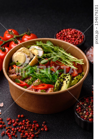 Seared tuna tataki in a bowl with sesame seeds, rice, and vegetables. Tuna tataki Seared tuna tataki in a bowl with sesame seeds, rice, and vegetables. Tuna tataki 134679281