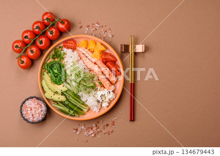 A prawn or shrimp bowl with rice, tomatoes, sauce, and vegetables, Asian food. Prawn or shrimp A prawn or shrimp bowl with rice, tomatoes, sauce, and vegetables, Asian food. Prawn or shrimp 134679443