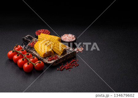 Corn cob cooked in chunks, vegetables, healthy vegetarian food. Boiled corn as a background Corn cob cooked in chunks, vegetables, healthy vegetarian food. Boiled corn as a background 134679602